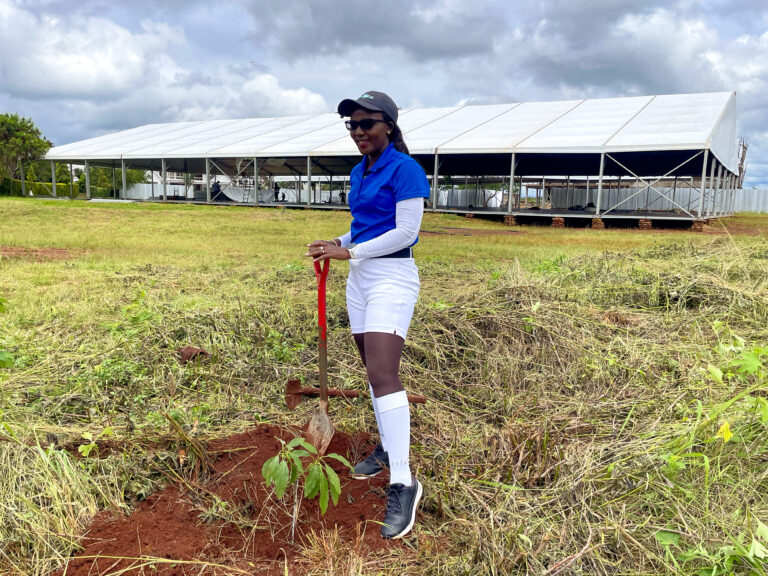 Jackline Cherop Sirai, founder of Girls Who Golf, posing next to a tree she has just planted before a game of golf at Thika Greens Golf Resort on April, 17, 2026. Photo: Ivan Vodohi, bird story agency