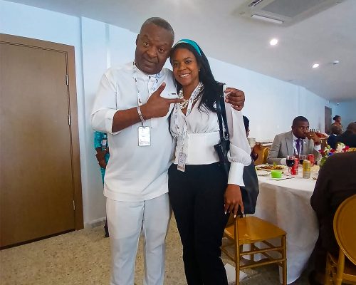 Channel Andrews poses for a photo with one of the delegates at the Biashara Afrika Summit in Lome, Togo. Photo courtesy: Channel Andrews